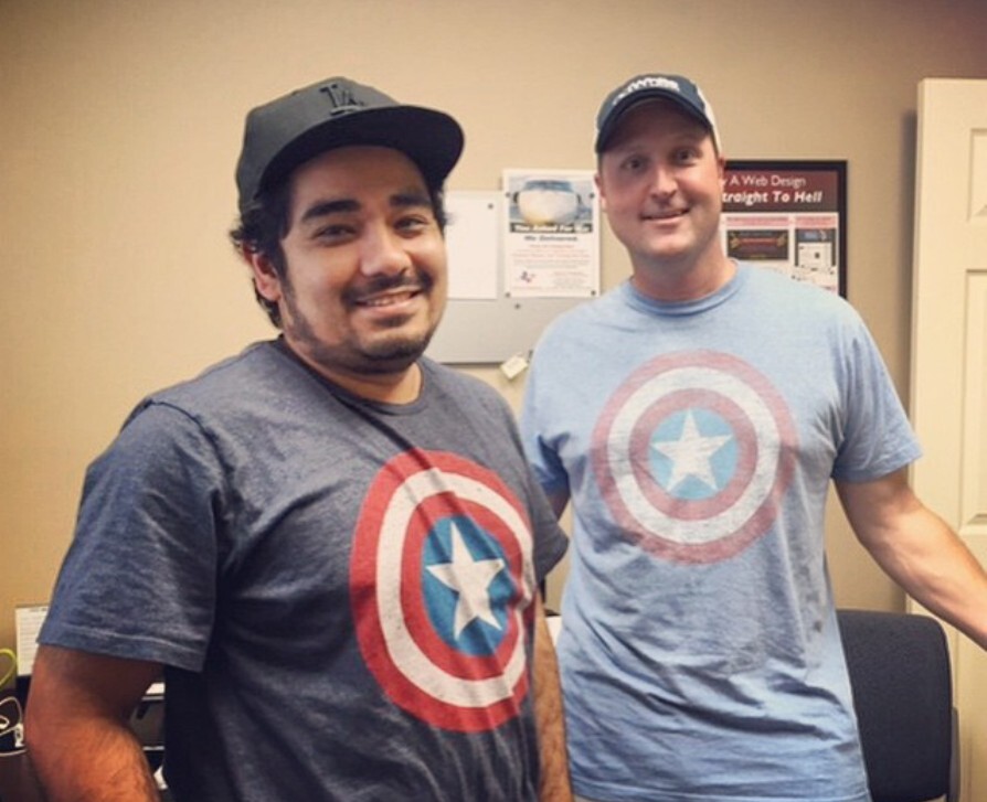 adWhite employees in Captain America shirts