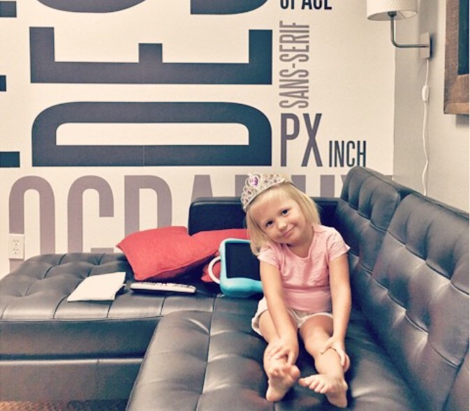 adWhite child visiting conference room