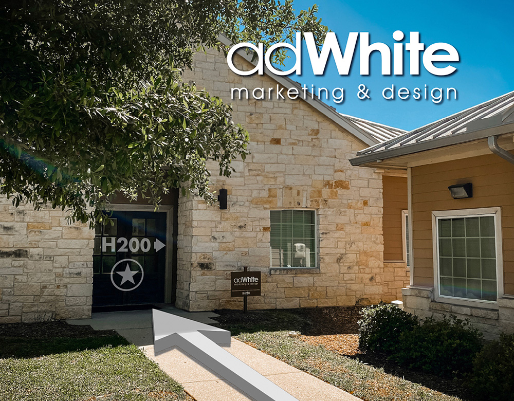 adWhite’s front door with labeled suite number and arrow indicating office location